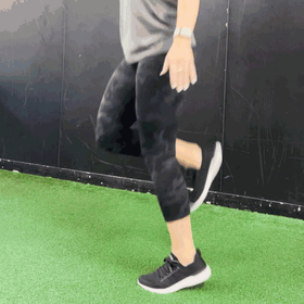 Renew physiotherapist demonstrates Butt kicks