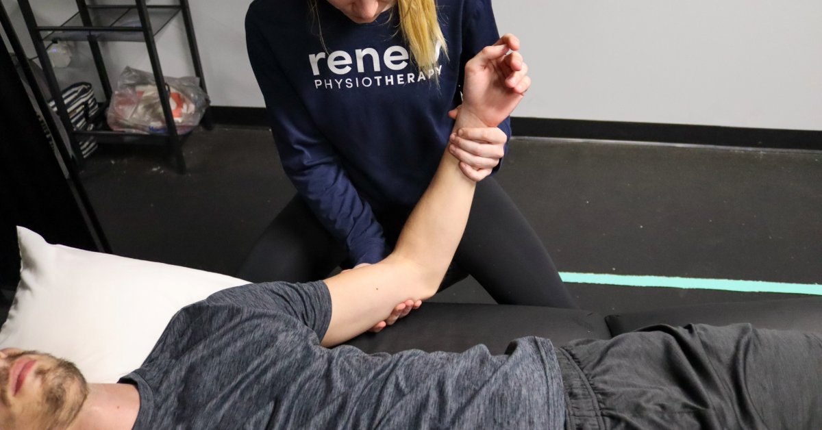 a Renew Physiotherapist performing a manual therapy on a man with nerve pain in his arm